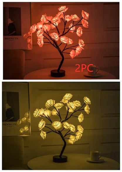 White and red rose flower LED lamp on a table with bonsai tree shape and warm white glow.