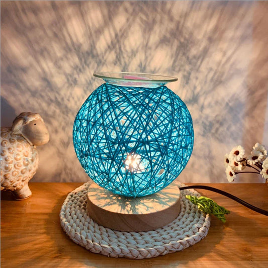 Elegant bamboo wood wax melt warmer with dimming night light feature, available in beige, blue, and pink colours