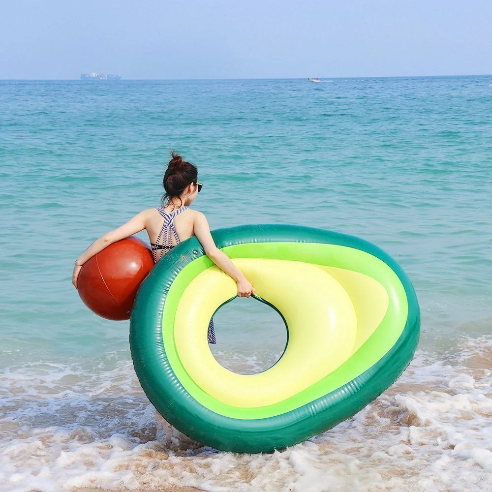 Giant avocado-shaped inflatable pool float for swimming and parties