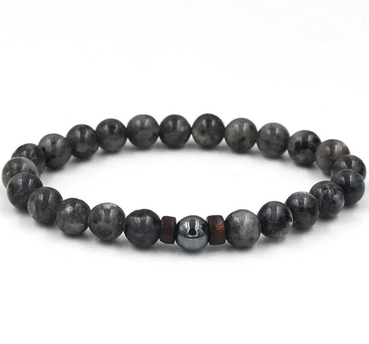 A stylish and durable men's bracelet made with volcanic stone, flash stone, and wood chips