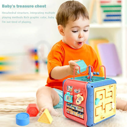 Colourful hexahedron educational toy with bead maze, gears, shape sorter, and clock face on different sides