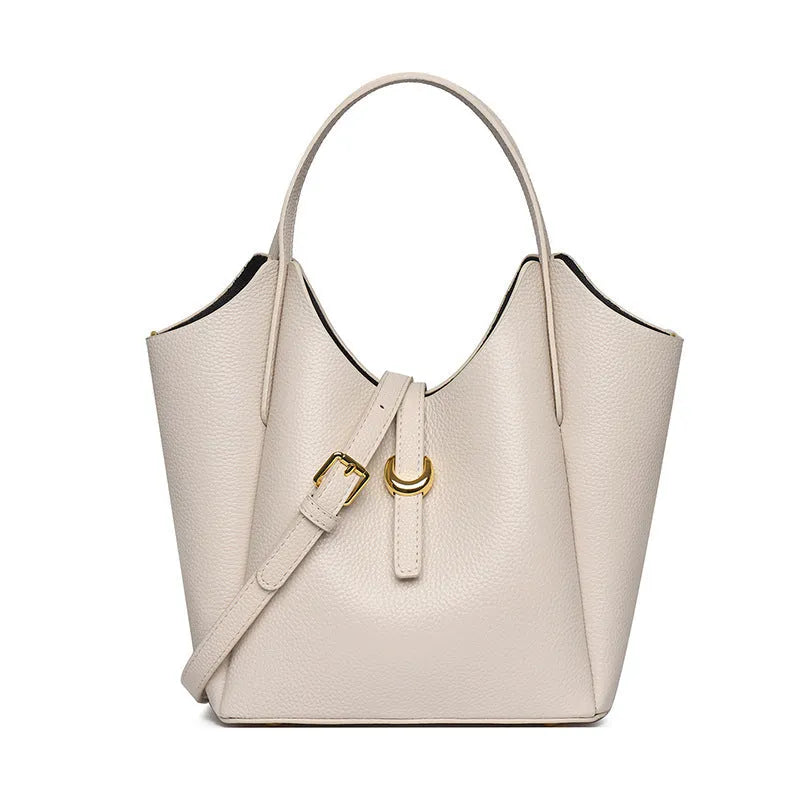 Genuine cowhide leather women's bucket bag in retro style with contrast stitching.