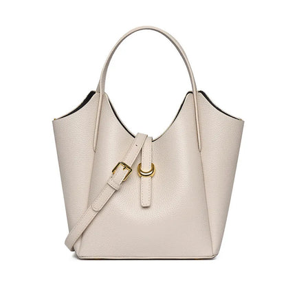 Genuine cowhide leather women's bucket bag in retro style with contrast stitching.