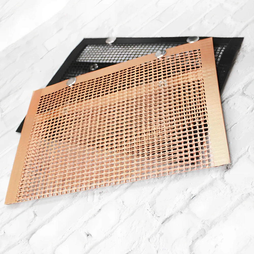 Black grill mesh bag with non-stick grid mat for BBQ cooking showing smoke-through design