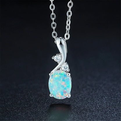 Water drop opal pendant on an adjustable O-shaped alloy necklace in rose gold or white.
