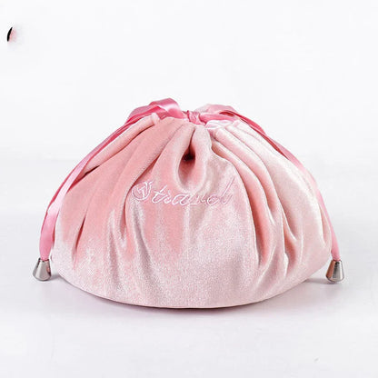 Adorable rabbit ear velvet cosmetic bags in various colors for storing and organizing makeup, toiletries, and other beauty essentials.