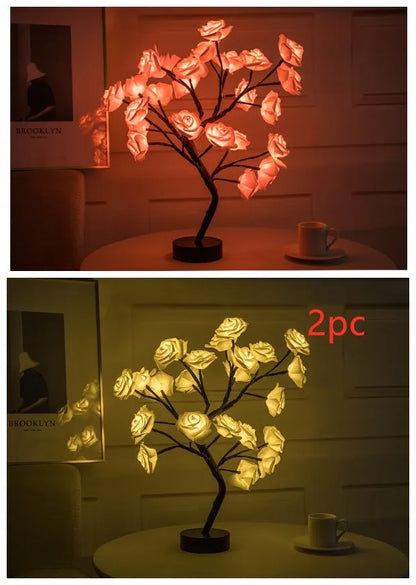 White and red rose flower LED lamp on a table with bonsai tree shape and warm white glow.