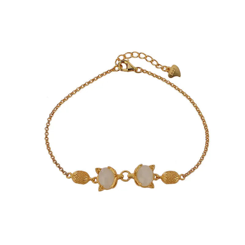 Retro-style women's silver bracelet with a jade centrepiece and extension chain.