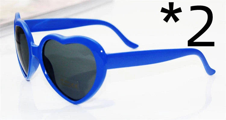 Fashionable heart-shaped light-up glasses with a built-in LED lighting system, perfect for adding a touch of love and playfulness to any occasion.