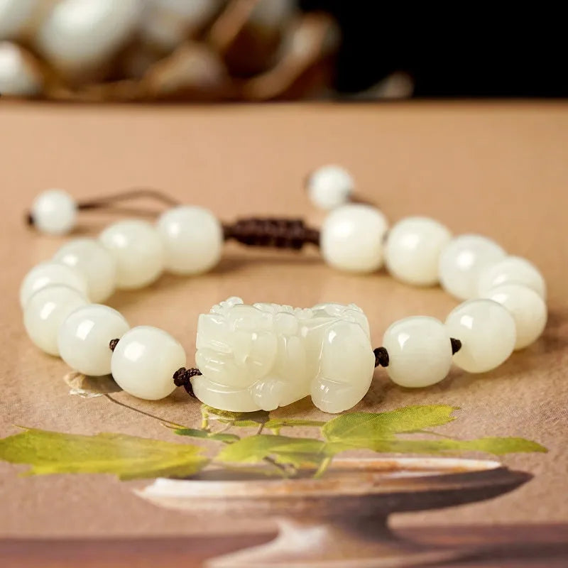 Hetian jade bracelet with black and red adjustable ropes in traditional Chinese design