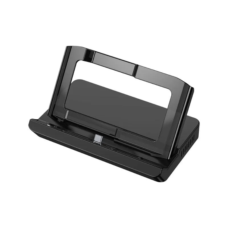GPD WIN4 handheld game console sitting in a black docking base expander showing multiple ports on the front.