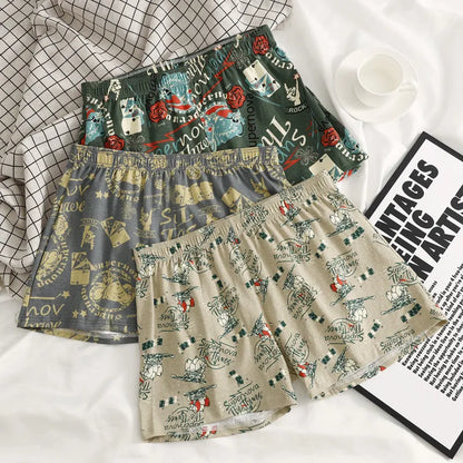 Men's loose fit cotton printed boxer shorts in a grey and blue pattern on a mid waist design.