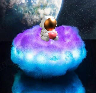 Enchanting cloud-inspired astronaut lamp with a rainbow-like glow, creating a mesmerising and whimsical atmosphere.