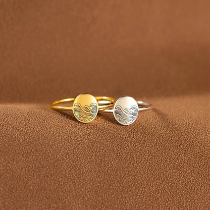 Sterling silver ring with elegant wave-inspired design, inspired by the natural beauty of the British coastline