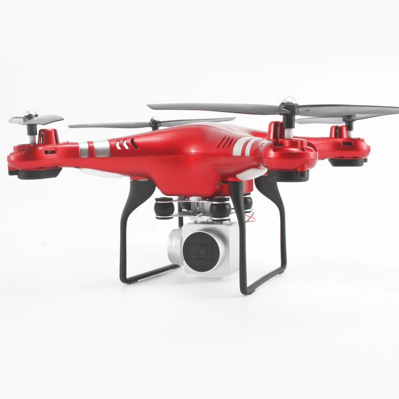 Alloy-built black HD aerial photography drone with remote control handle on grass