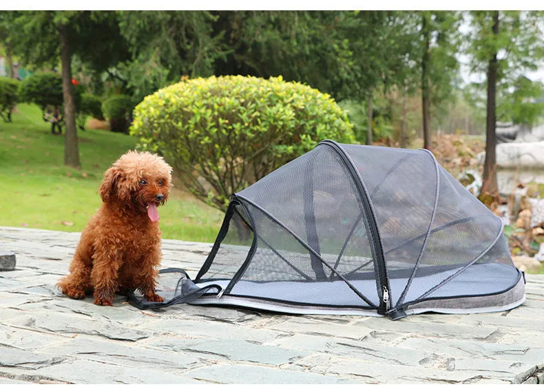 Black and blue half mesh portable folding tent for cats on a grey background.
