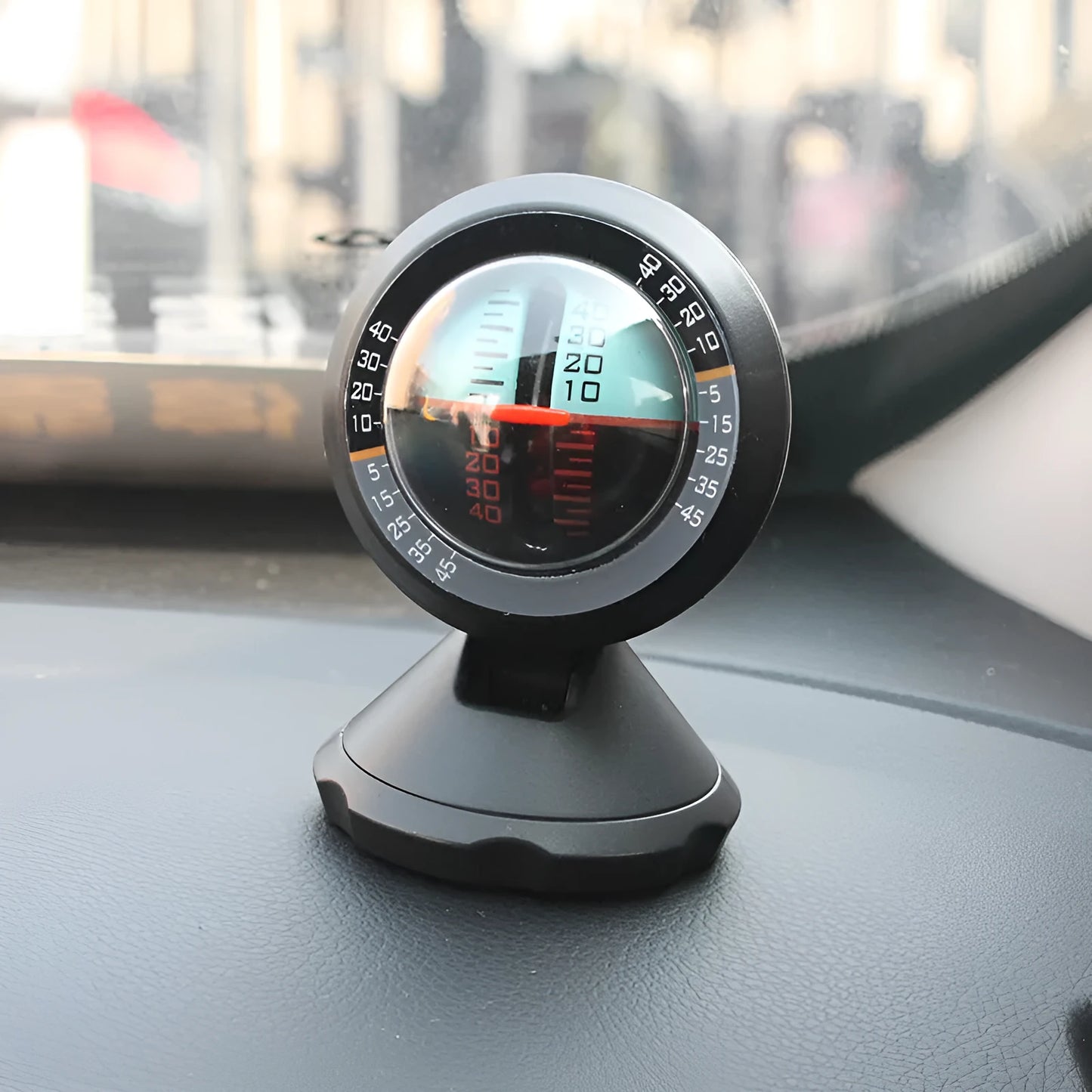 Black vehicle mounted slope meter with adjustable viewing angle for measuring automotive pitch and roll