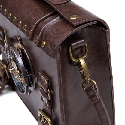Bronze steampunk industrial retro shoulder bag with metal hardware on horizontal square pillow bag design