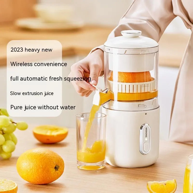Fresh green portable USB electric juicer and blender for oranges and vegetables on a kitchen counter.