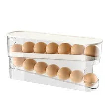 White plastic refrigerator slide-out egg dispenser tray mounted on refrigerator door