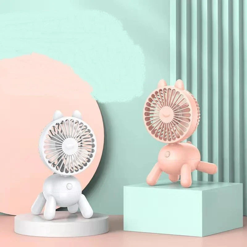 Compact portable USB-powered desktop cooling fan with adjustable airflow and shaking head