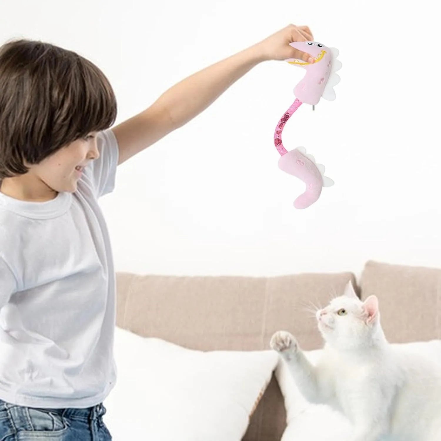Set of four colourful plush cat toys: a mouse, a fish, a bunny, and a chew toy on a plain background.
