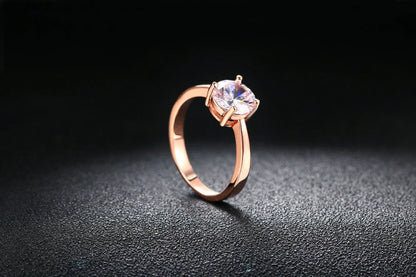 Close-up of a beautiful rose gold ring with sparkling zircon stones