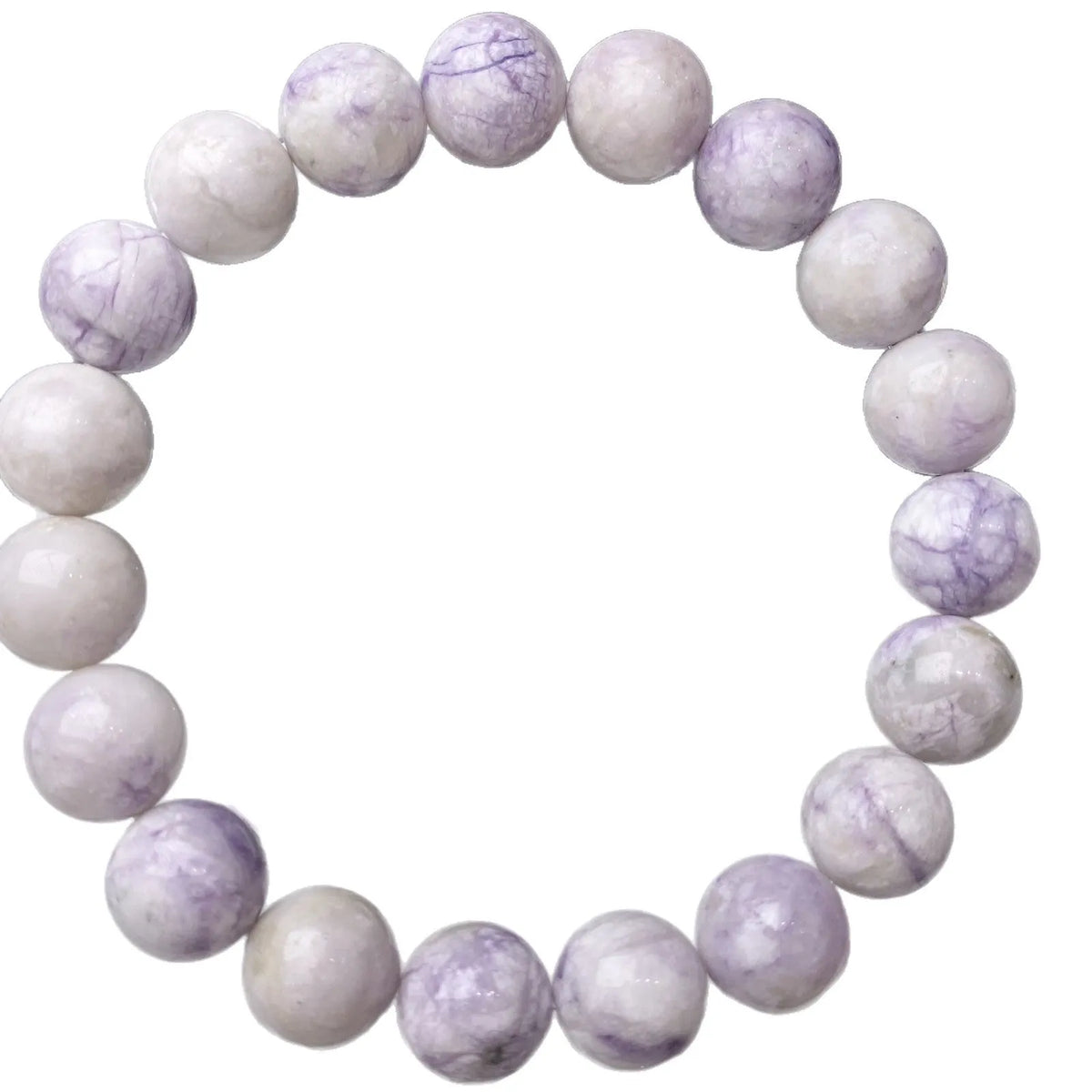 Close-up of a purple turquoise gemstone bead bracelet with an adjustable leather cord fastening.