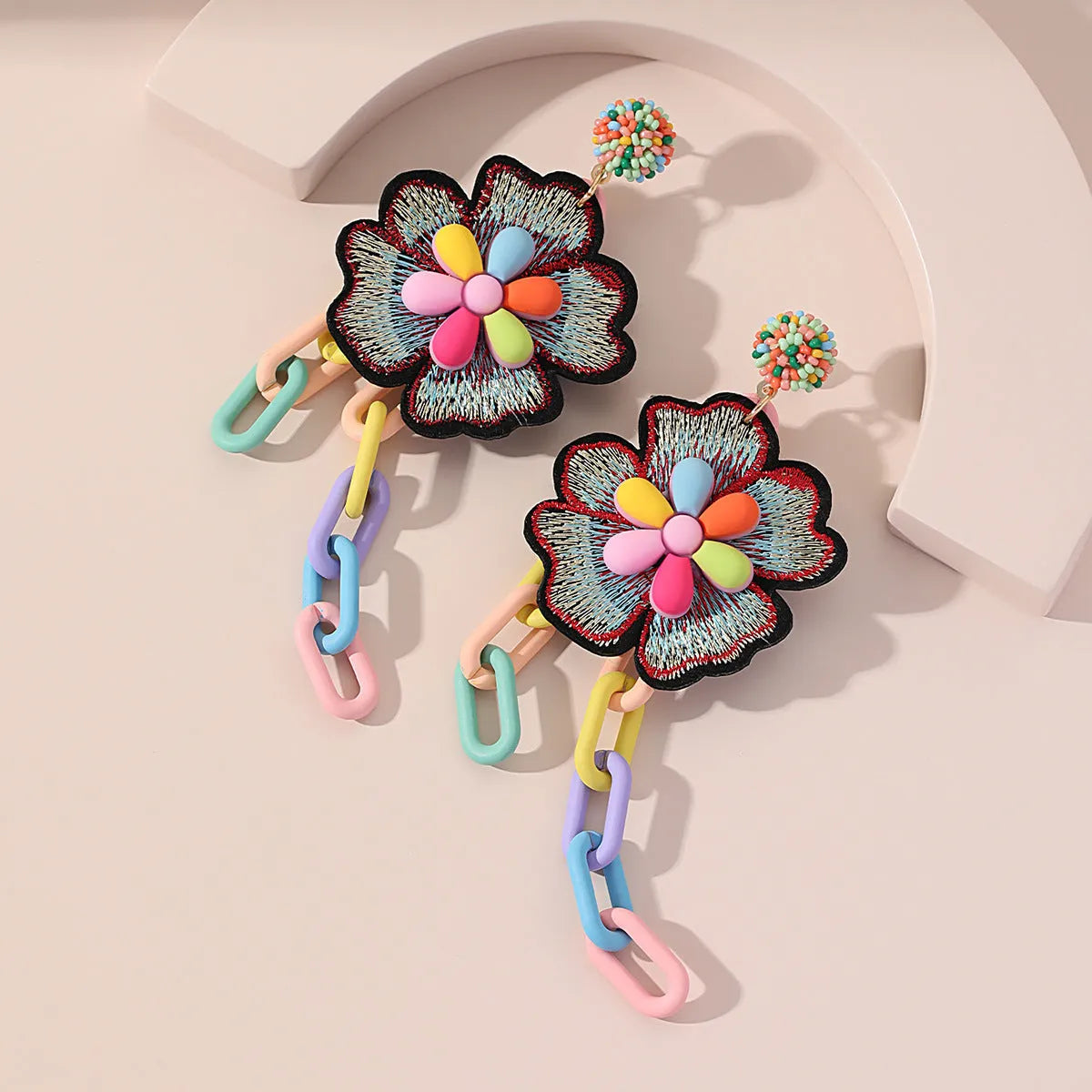 Handmade bohemian shell tassel earrings for women with colourful flower and geometric drop design