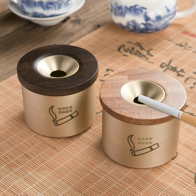 Retro brass ashtray with wooden lid on copper base, showing 12cm diameter and central hole