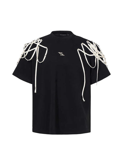 Black loose fit short sleeve T-shirt with rivet ribbon padded shoulder detail and round neck