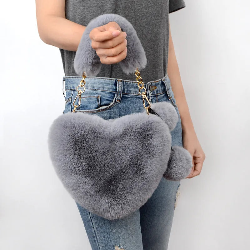 Plush heart-shaped women's handbag in medium size with removable shoulder strap