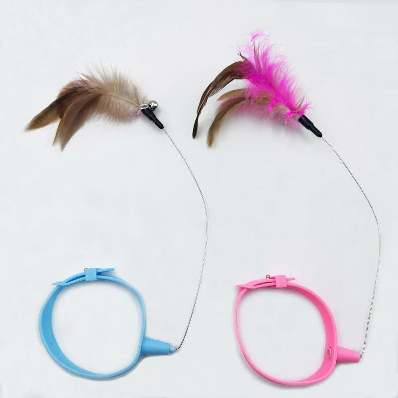 Cat collar teaser toy with feather and bell attachment on adjustable 32.5cm strap
