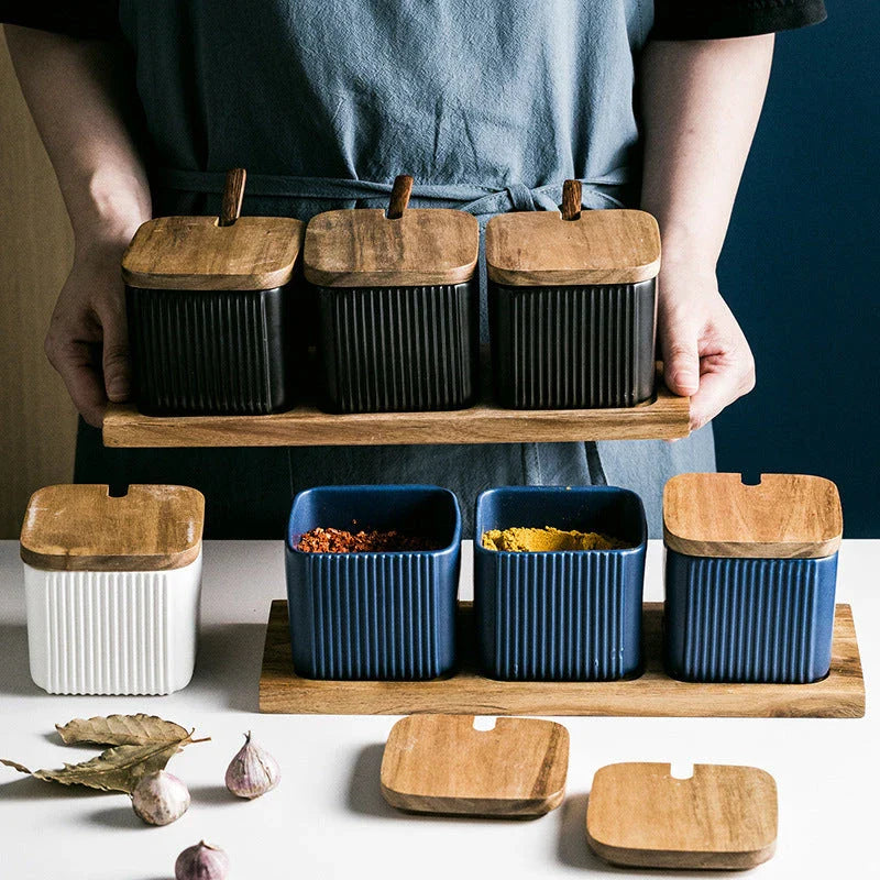 Stylish ceramic seasoning jars in a modern kitchen setting, featuring a matte glaze finish and a variety of color options.