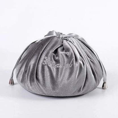 Adorable rabbit ear velvet cosmetic bags in various colors for storing and organizing makeup, toiletries, and other beauty essentials.