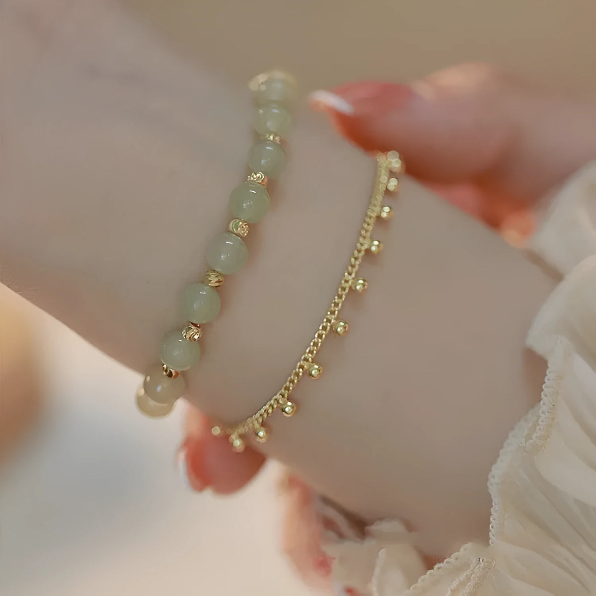 Handmade natural Hetian Jade women's bracelet in a classic beaded style.