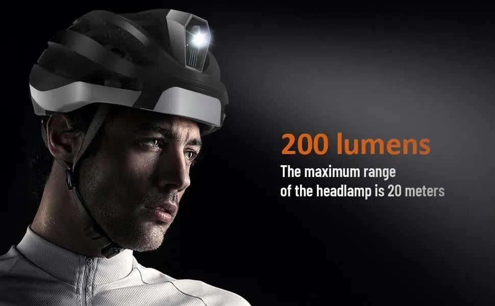 Black and grey adult cycling helmet with integrated Bluetooth warning light on the rear.