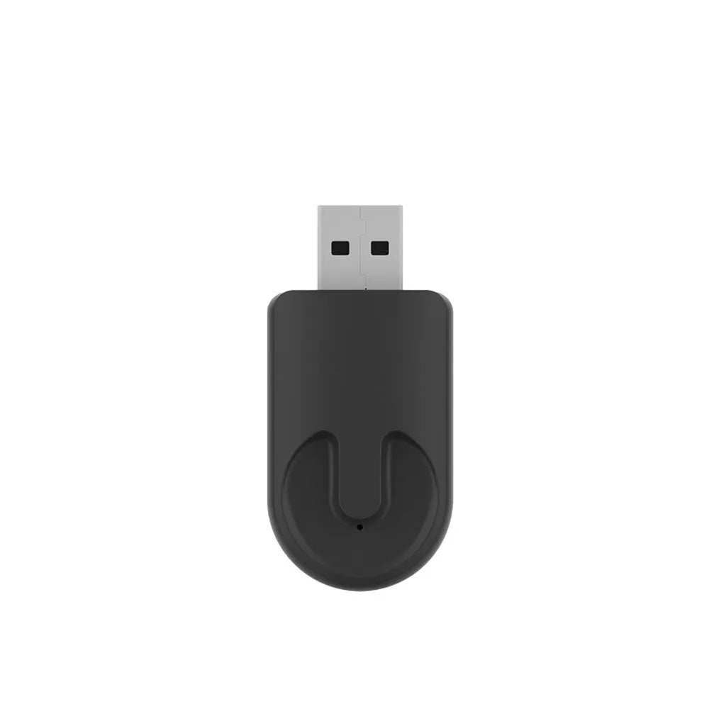 Black CarPlay USB wireless adapter showing compact design with USB connection interface