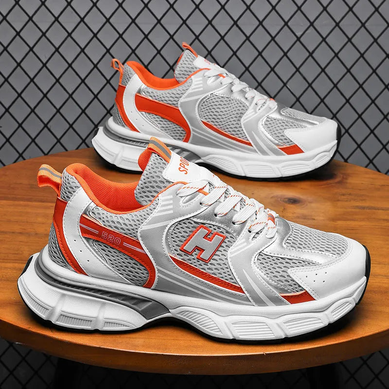 Men's mesh running shoes with plastic sole in black, white and grey, or white and orange colours