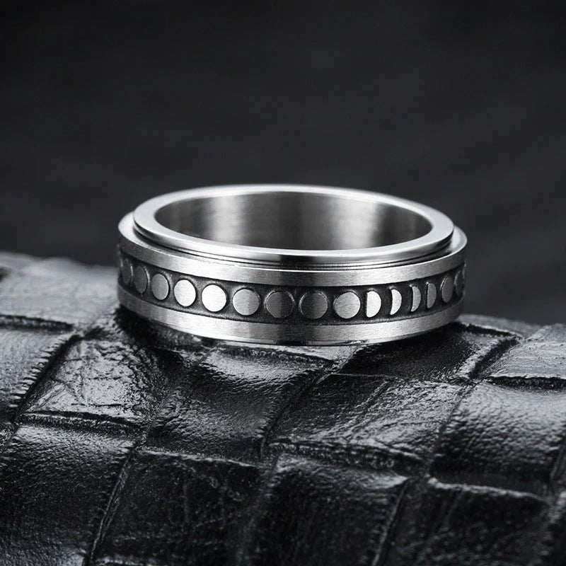 Rotatable stainless steel spinner ring with moon and star designs for anxiety relief and style