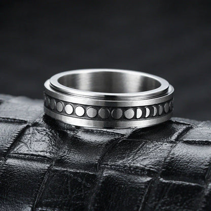 Rotatable stainless steel spinner ring with moon and star designs for anxiety relief and style