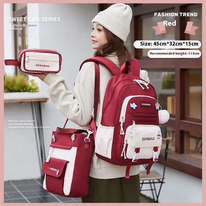 Pink girls school backpack with curved shoulder straps on a wooden floor