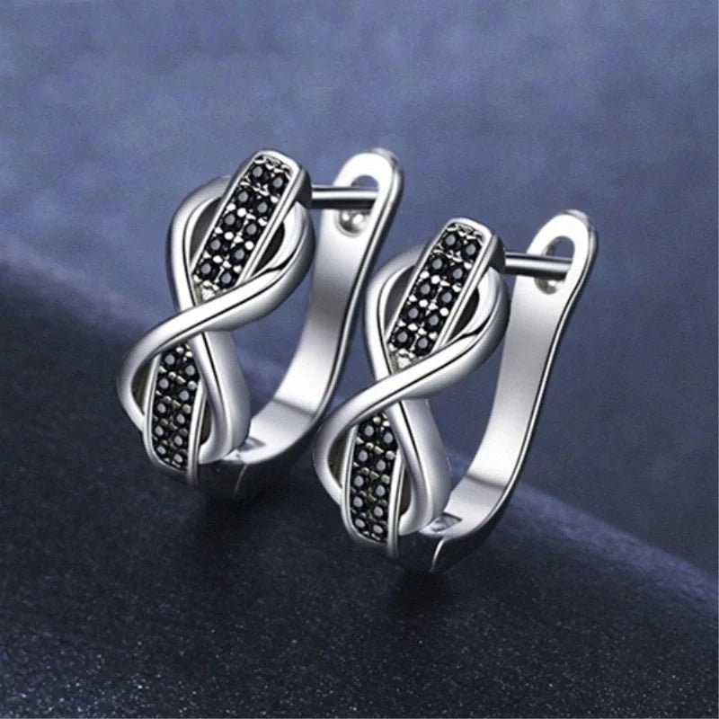 Copper earrings with round lines and micro inlaid zircon, black colour