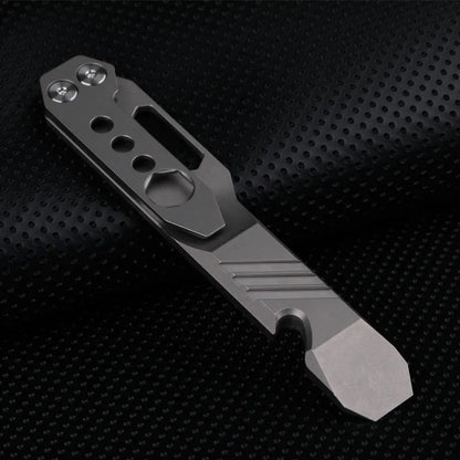 Titanium alloy multi-function crowbar tool with bottle opener on a stone wash finish background.