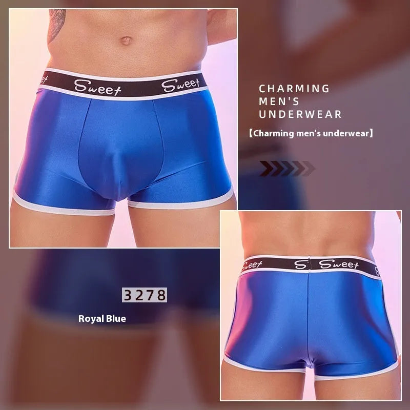 Men's shiny silky nylon boxer briefs in black, white, and sapphire blue colours.
