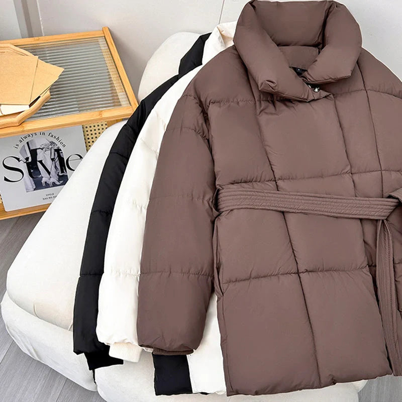 Stylish plaid belted winter coat for women in black, white, and brown