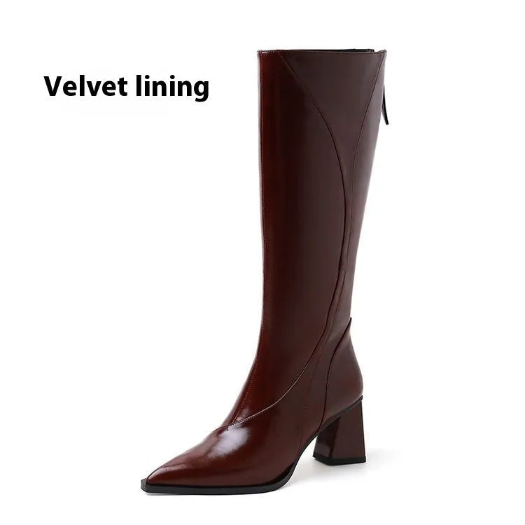 Women's black retro high heel riding boots with a waterproof platform and cowhide upper.