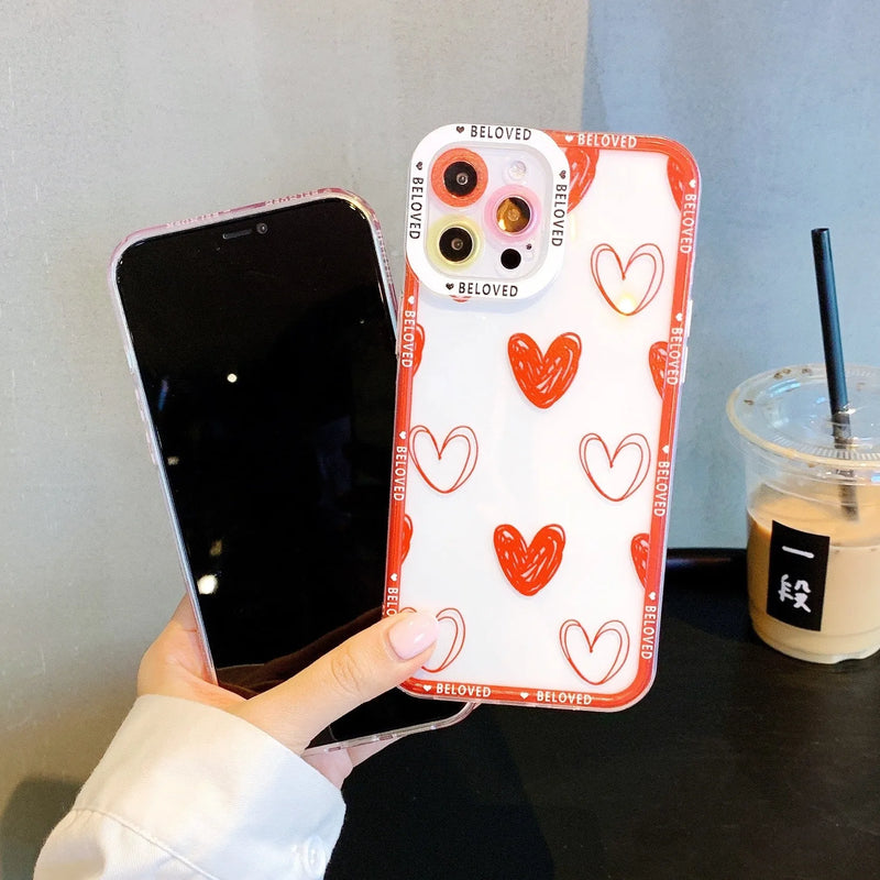 Mobile phone case made from flexible TPU material with angel eye and love heart design, compatible with iPhone X XS XR 11 12 13 models including Pro and Pro Max versions in pink or graffiti red colour options