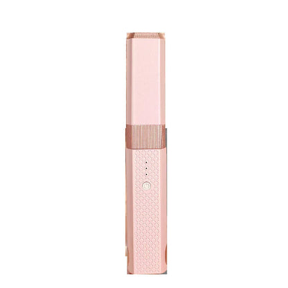 Pink and green cordless mini USB hair straightener and curler with ceramic plates.