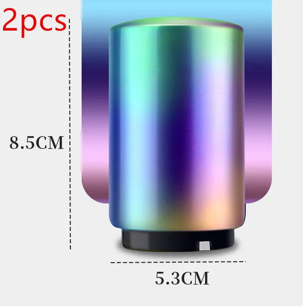 Stainless steel automatic bottle opener measuring 8.4 cm by 5.3 cm on a kitchen counter